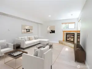 LOWER FLOOR REC ROOM LVP FLOORS GAS FIREPLACE