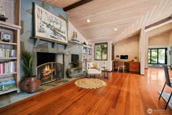 This fireplace is a pinnacle part of the home and such a grand feature. There are built-in bookcases on either side and the perfect desk alcove.