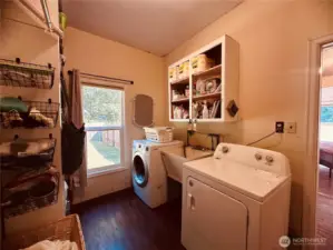 Functional laundry room with extra storage.