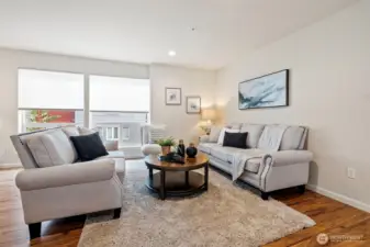 Oversized windows light up this main living area.