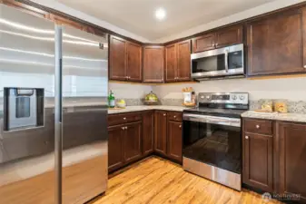 The kitchen blends function and style, offering the perfect backdrop for gatherings large or small.
