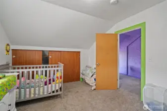 Upper level bedroom nursery with large closets