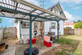 Covered porch in back of house