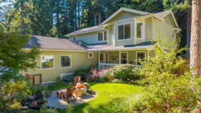 Relax on the patio overlooking the beautiful perennial garden. The front yard is fully fenced!