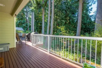 Enjoy the private wooded views from the deck.