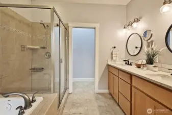 Primary bath with large shower and soaker tub