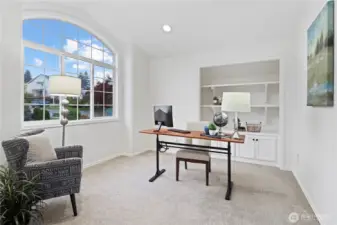 This den is just up the stairs off the front door - built in shelves!