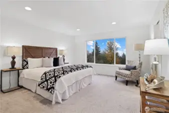 The primary suite has beautiful eastern views - sunrise, Cascade Mountains, even hot air balloons!