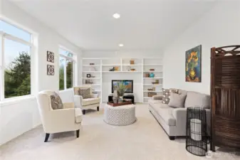 What a great, light-filled additional family room - or alternative living room for parents?