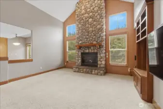 Large family room with vaulted ceilings allows plenty of natural light.