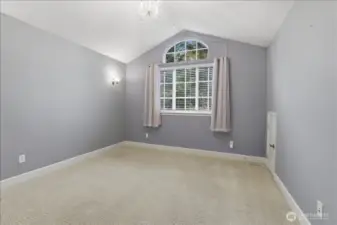 2nd bedroom - small door to the right is perfect access for little one's into the play room.