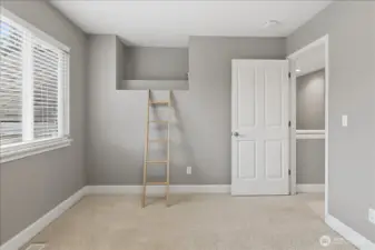 Fourth bedroom with a small lofted area.