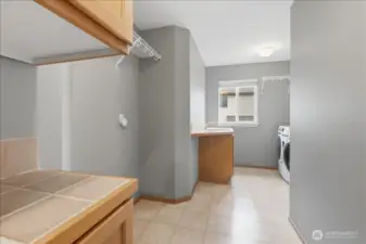 Spacious upstair laundry room - washer and dryer will convey.