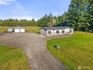 4.81 acres. Built in 2023, 3 bed, 2 bath 1566 sq ft. w/24X30 Shop.