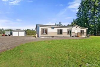 Home with plenty of room and partially fenced.