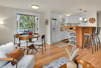 Kithen, dining area, french doors to the deck overlooking the back yard