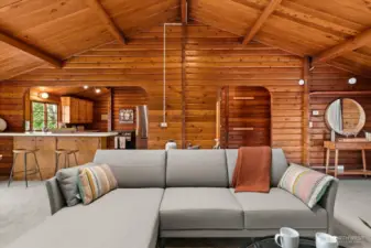 Stunning, vaulted wood ceiling with exposed beams offers a great room focal point