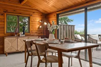 Dine while soaking in awe-inspiring sunsets through oversized sliding doors that frame picturesque lake and scenery