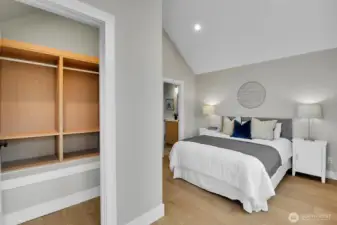 Primary bedroom closet w/ built-in organizers