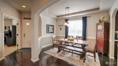 Cozy front entry, with the office just to the right and formal dining room to the left.