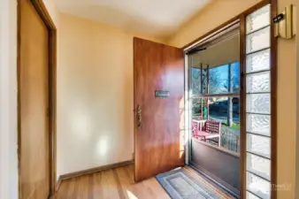 A spacious foyer with coat closet welcomes all you enter.