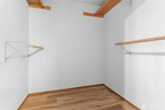 Primary bedroom walk in closet.