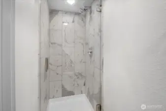 Custom Glass Shower Enclosure for Primary Bathroom