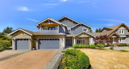 3 car garage and ample driveway parking