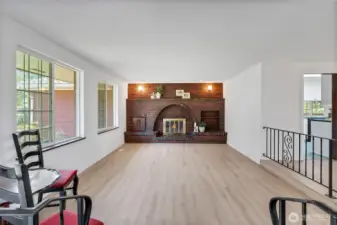 Living Room With Beautiful Brick Wood Burning Fireplace
