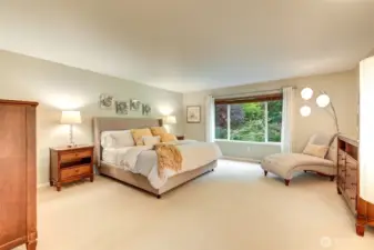 “Expansive primary suite set apart on its own side of the home, creating a private retreat.”
