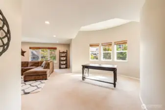 “Expansive upstairs bonus room offers endless options—perfect for a home theater, playroom, gym, or hobby space.”