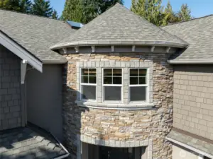 Take a closer look at the brand new roof with a transferable warranty. Also the gorgeous details of the turet that is part of the bonus family room upstairs