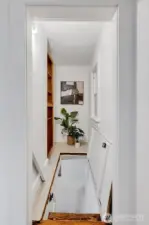 Stairs to the lower level - Home also has an exterior entrance.