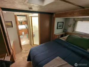Looking out the bedroom to the living space of the trailer