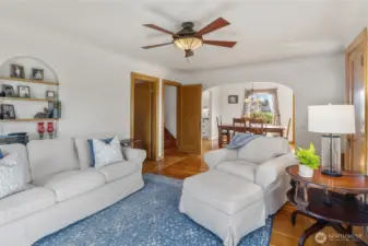 Living room with Dining, stairs to upstairs, hallway to bedroom and office