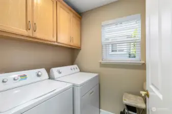 There's ample space and storage in the main-floor laundry room.
