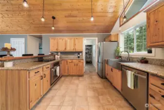 Large kitchen has plenty of storage and counter space. Beautiful real wood cabinets too.