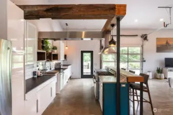 A custom built kitchen with reclaimed lumber accents