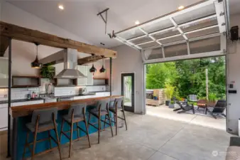 Enjoy indoor-outdoor living with the massive garage door