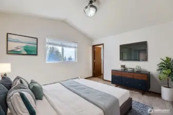 Master bedroom with vaulted ceilings