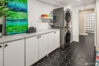 Laundry & mudroom with access to garage
