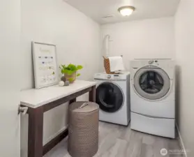 Spacious laundry room.