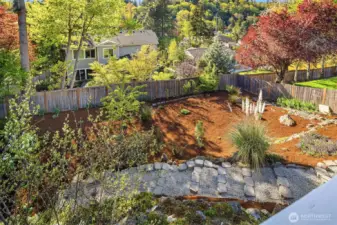 View from the deck of the large backyard.