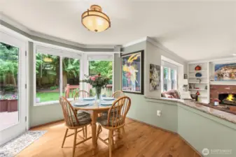 Back door leads out to an expansive deck, and lush back yard.