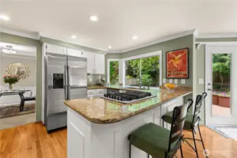 Updated kitchen with granite countertops, new dishwasher, newer fridge.
