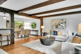 Exposed beams warm up this bright, open great room.