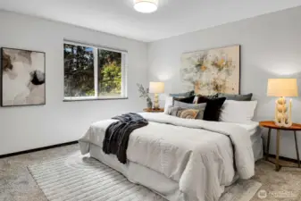 The primary bedroom boasts and en-suite bathroom and plenty of room for a king sized bed.