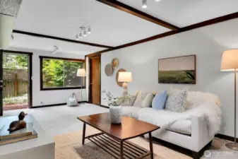 With a separate entrance and adjacent spa bath, the lower level rec room could easily evolve into a second primary suite, multi-generational living, or ADU.