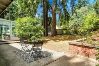Out back, a generous patio connects the dining room to the sunroom and deck. The backyard gate opens onto walking paths and a perfect sledding hill!
