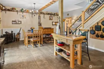 The concrete floors are stamped to look like wood! Beautiful & low maintenance. Corner propane fireplace too.